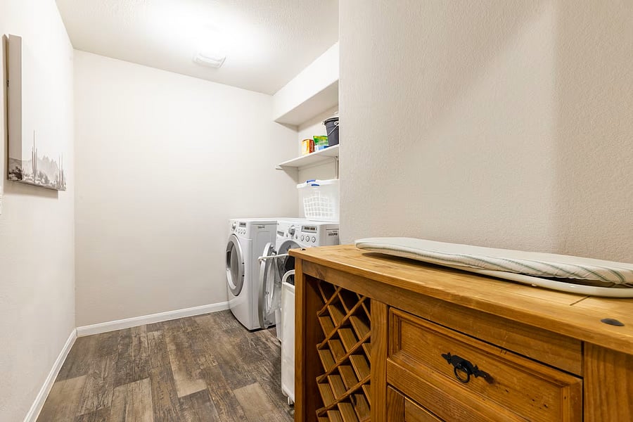 Laundry room with small desk for a laptop