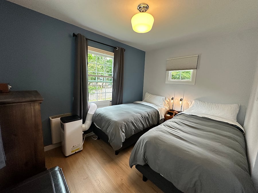 View of the back bedroom with two twin XL beds that can be turned into a single king.