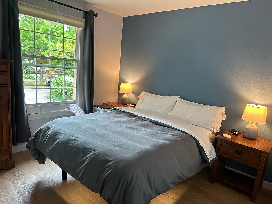 View of the front bedroom with queen bed facing North.