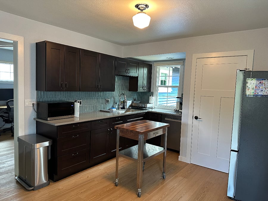 View of the kitchen with portable island in place.