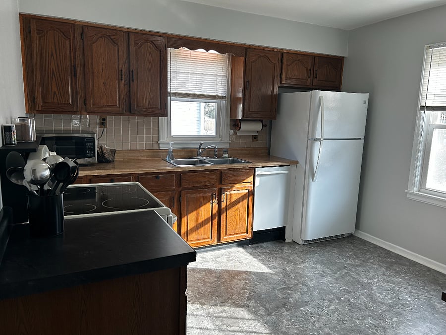 Fully stocked kitchen; stove/oven, refrigerator, dishwasher, microwave, Keurig coffee maker, blender, tea kettle, baking items, cooking essentials, dishes, glasses, flatware, and more