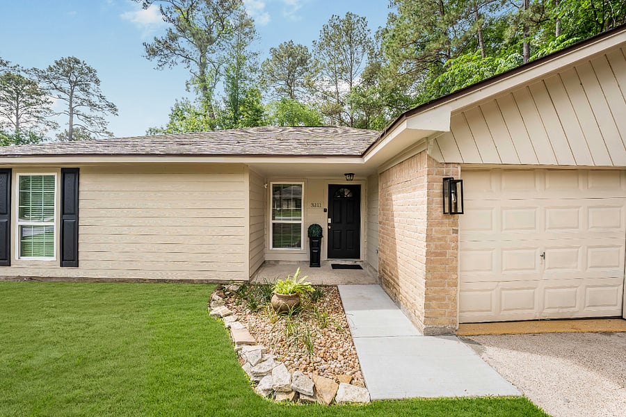 Front of house with 2 car garage parking!