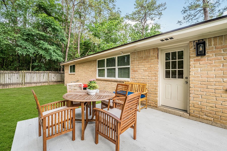 Backyard is large, fenced in with nice outside dining option!