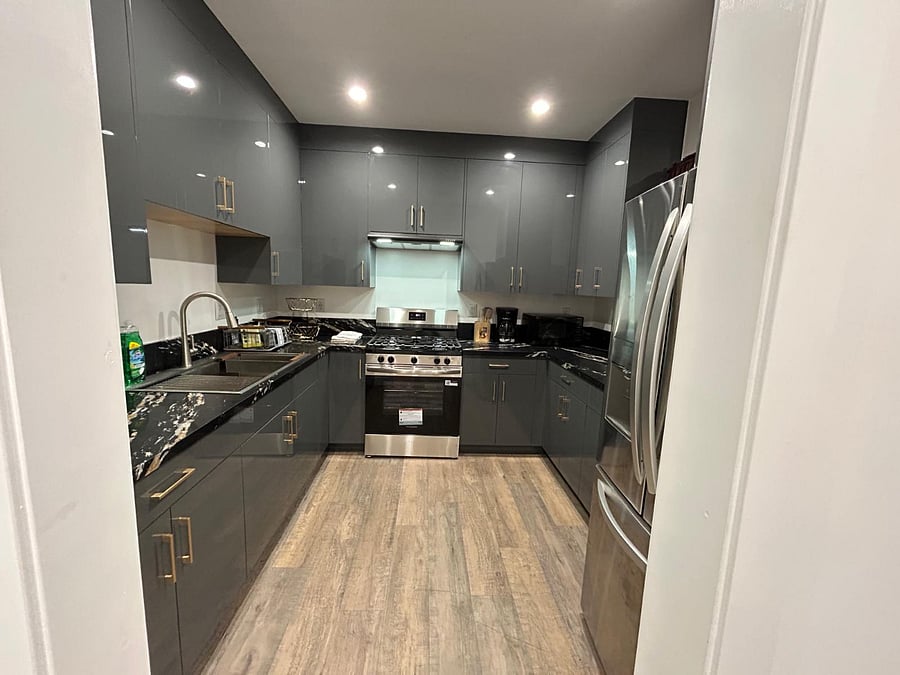 Full Kitchen, with stove, Fridge, Microwave, Basic Utensils and Coffee Pot.