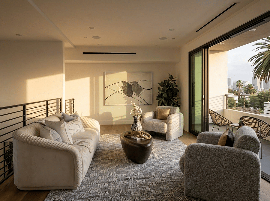 Second-floor living room featuring amazing Downtown LA views. A wine refrigerator and entertainment are for serving food and drinks and a 65-inch TV 
(Photos were taken before the TV was installed.)