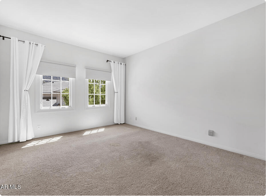 Bedroom #2 - Front of home, ensuite bath & walk in closet.