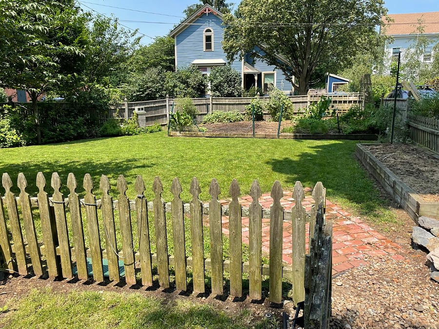2nd lot included with house rental - includes trees, gardens, and fenced-in green space