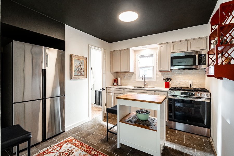 Newly updated kitchen with stainless appliances, new cabinets and flooring