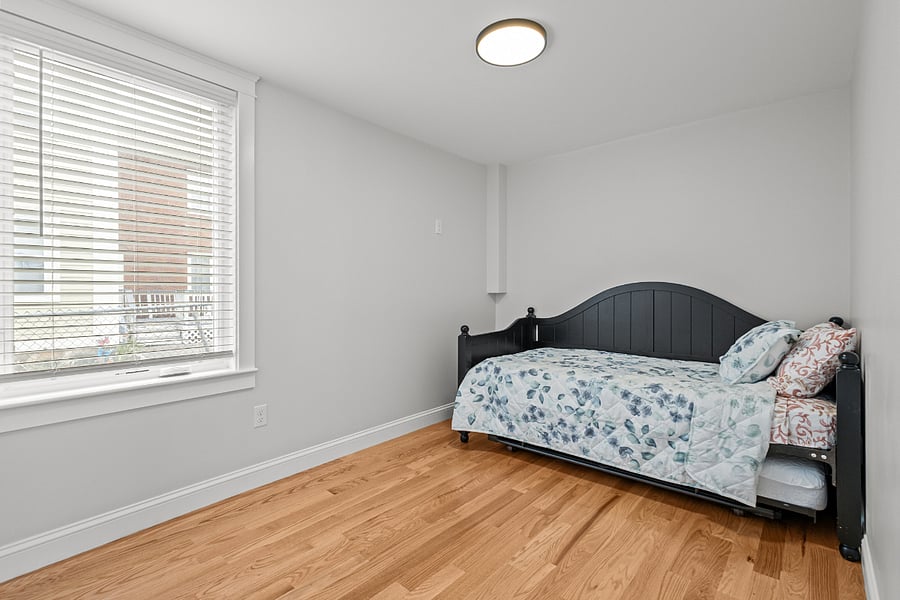 First Floor bedroom features twin bed, there is a trundle the turns the bed into a king!