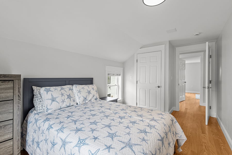 Additional bedroom featuring queen