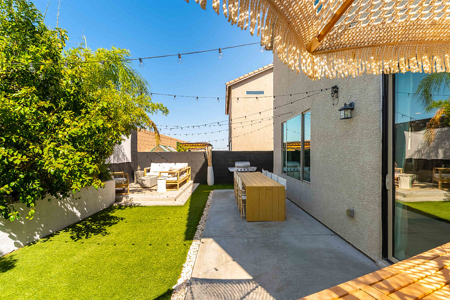 Peaceful green oasis with furnished space to relax and unwind.