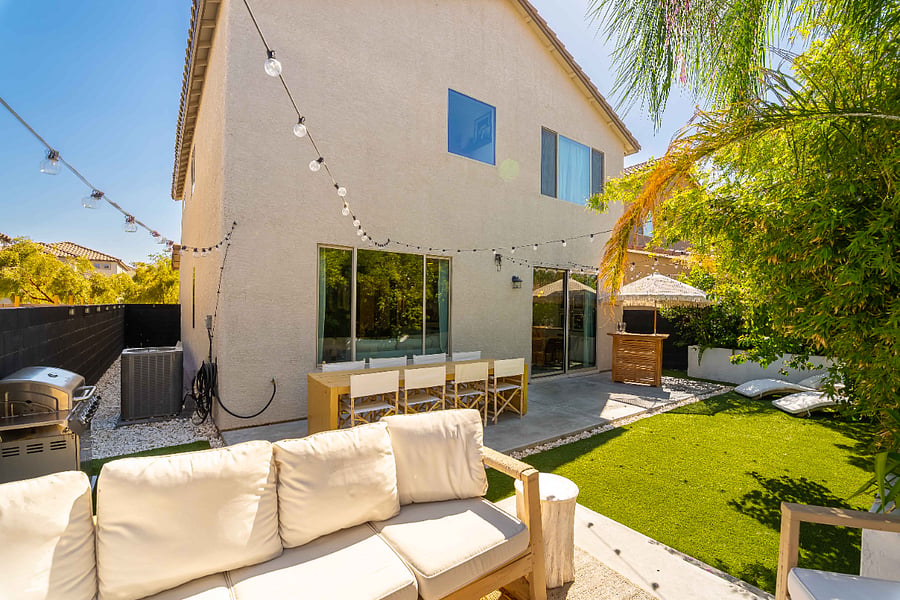 Peaceful green oasis with furnished space to relax and unwind.