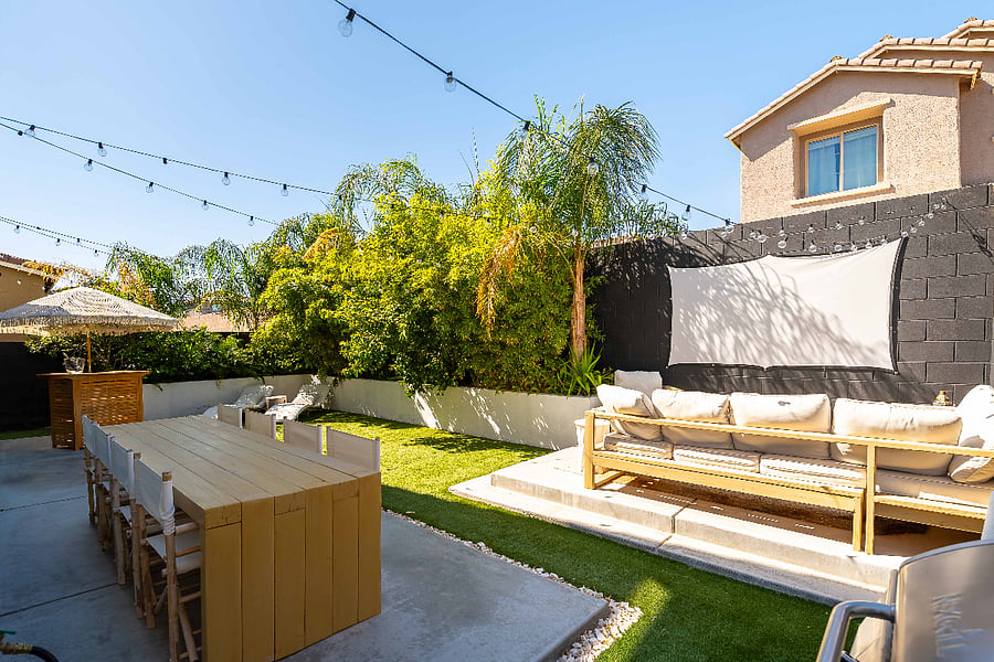 Peaceful green oasis with furnished space to relax and unwind.