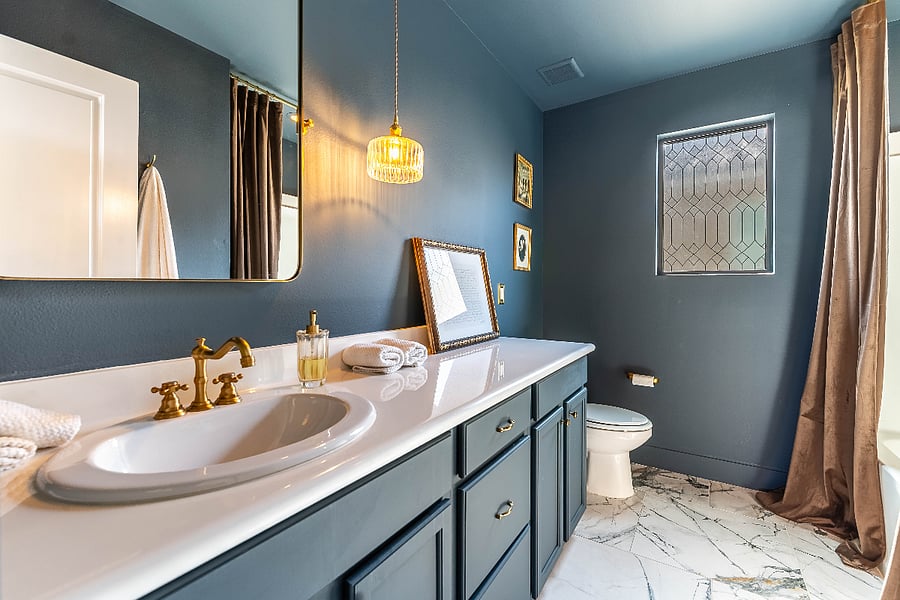 Beautifully designed second upstairs full bathroom with a spacious vanity and shower/tub combination.