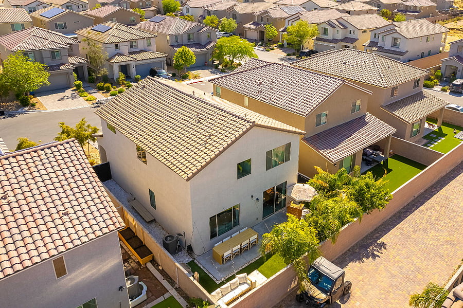 Aerial view of the full home, private landscaped backyard and quiet cul-de-sac setting.