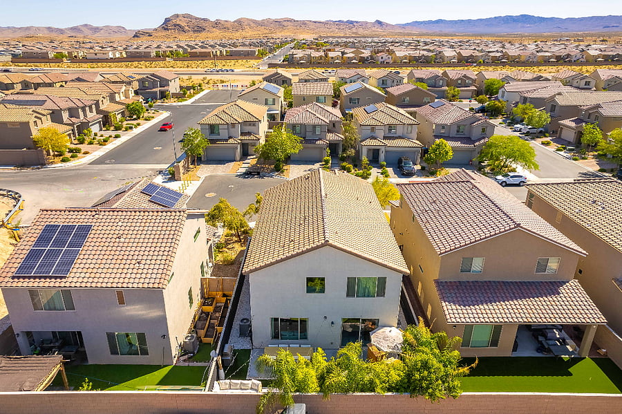 Aerial view of the full home, private landscaped backyard and quiet cul-de-sac setting.
