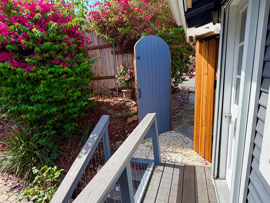 The locking gate, with parking space right outside. No stairs.