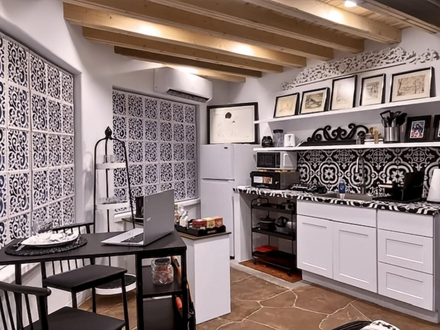 A spacious layout integrates living, dining, and work.