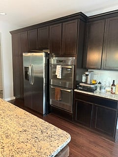 Full size refrigerator/Freezer and double gas ovens