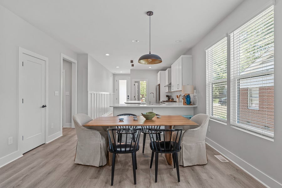 Dining area with solid wood table that seats 6.