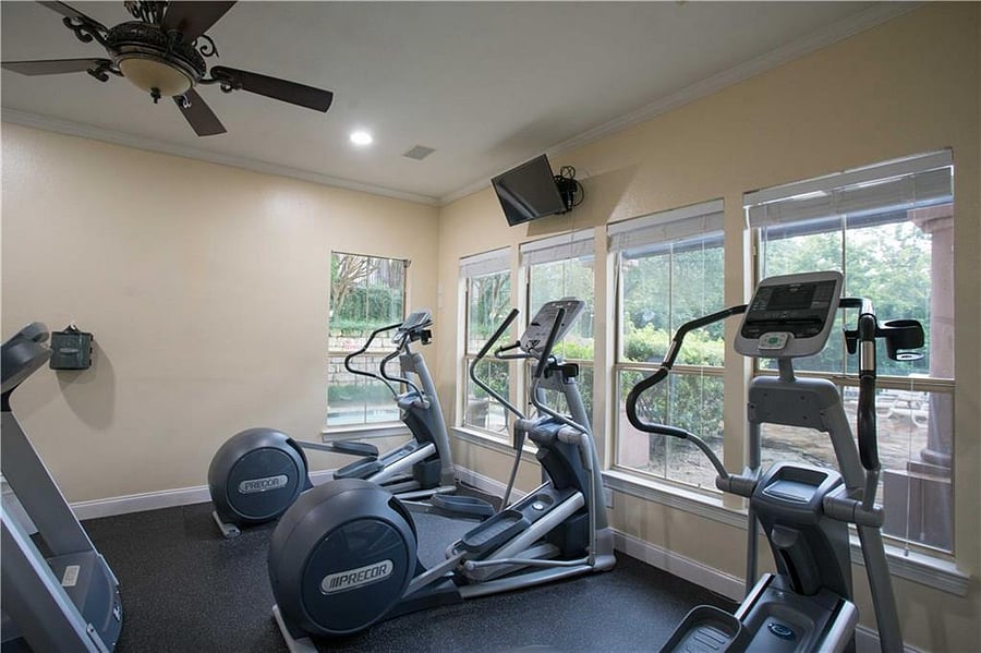 Cardio room with treadmills and ellipticals
