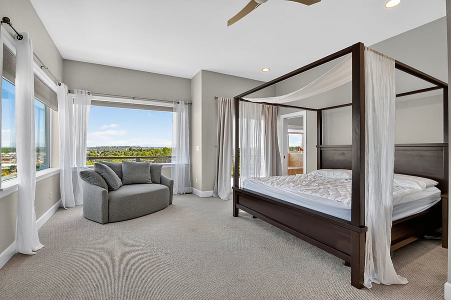 Large master bedroom with city views