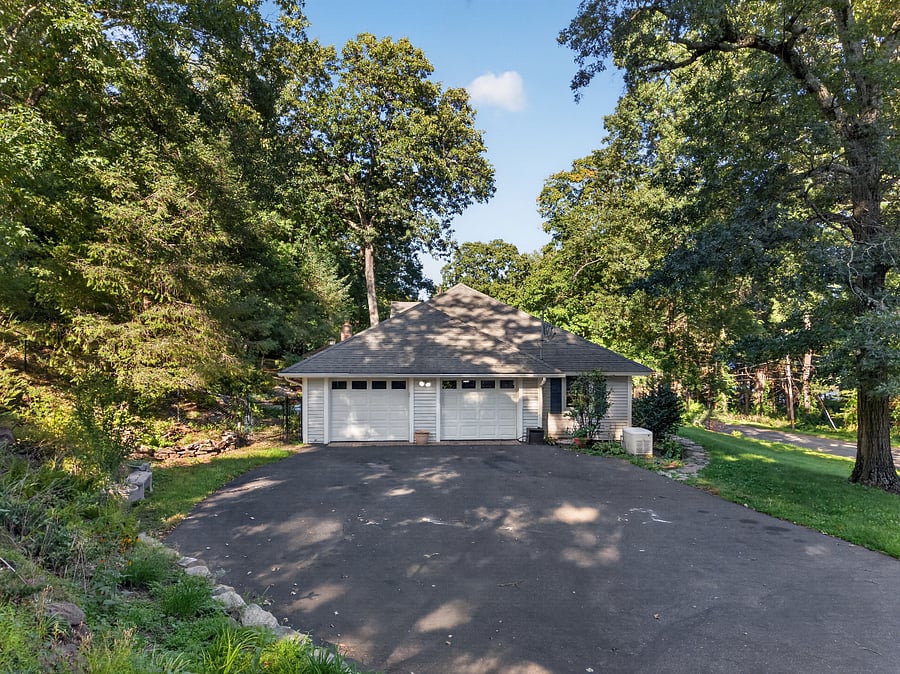 Wide, Flat, Resurfaced Driveway with plenty of room for maneuvering. 