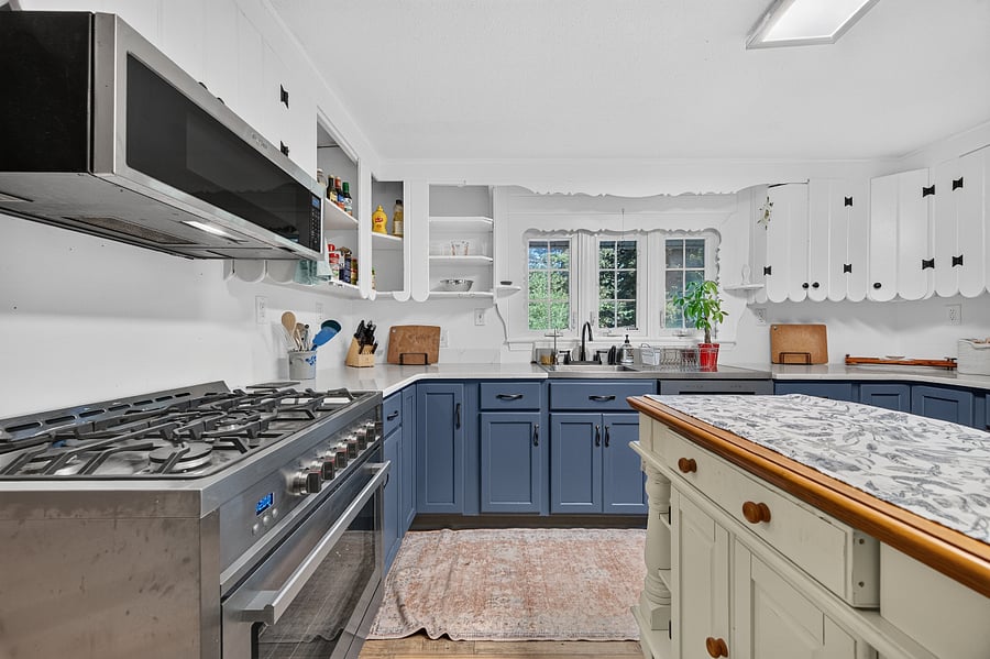 Plenty of counter space, lighting, storage and a view of the neighborhood. 