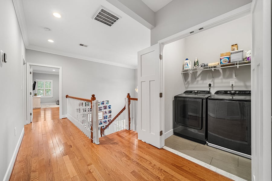 The upper-level washer and dryer provide everyday convenience.