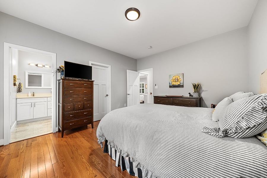A second bedroom offers a queen bed, its own private ensuite bath, and walk-in closet.