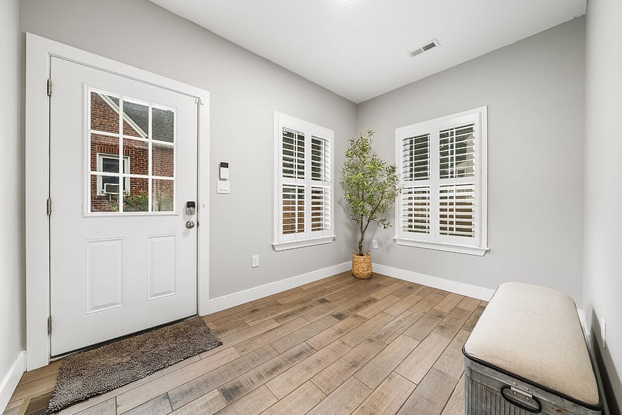 The mudroom off the driveways makes entries easy and organized.