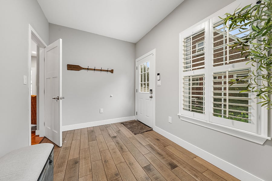 The mudroom off the driveways makes entries easy and organized.