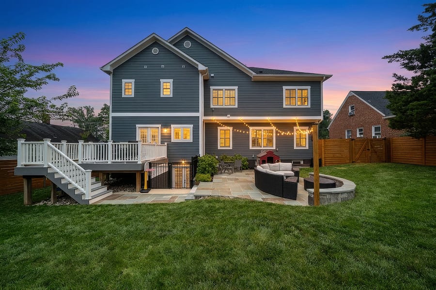 French doors off the kitchen open to a low-maintenance Trex deck overlooking a spectacular, fully reimagined backyard. Enclosed by a premium horizontal white cedar privacy fence, freshly stained in July 2026, the outdoor space features a gorgeous flagstone patio with a built-in sitting wall, tailored landscaping, and plenty of room for entertaining or relaxing outdoors.
