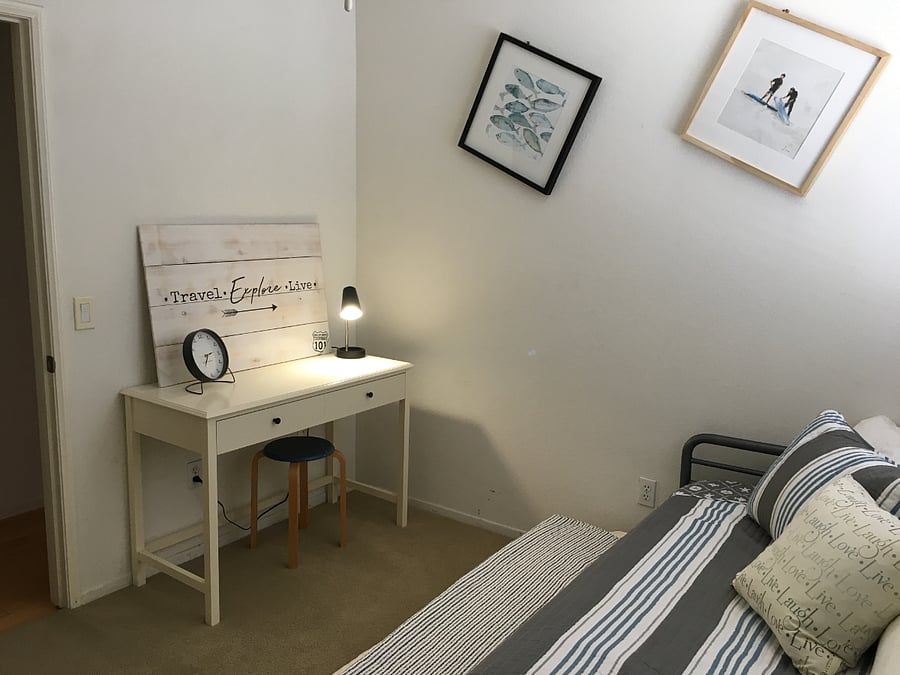 Guest room 2: Twin bed and workspace with computer monitor (not shown in photo).