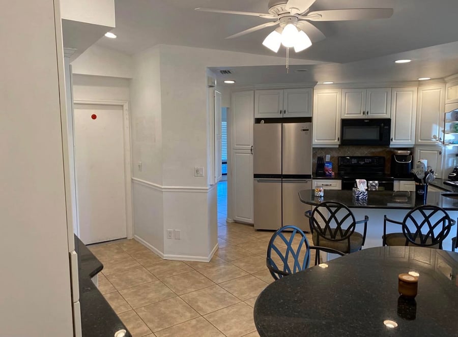 Kitchen, Dining area. Full sized Refrigerator.