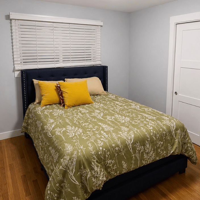 Cozy, fully furnished bedroom offering a comfortable and private space to unwind.