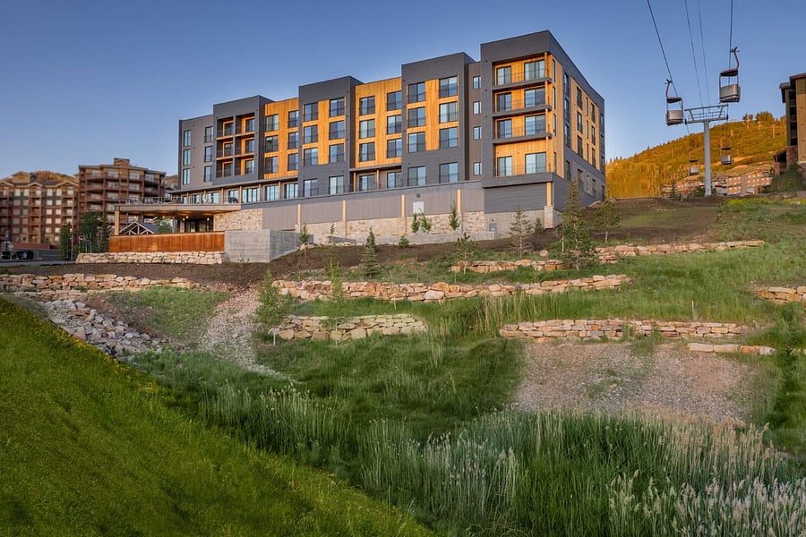 Canyon Haus exterior in the summer next to the Cabriolet lift