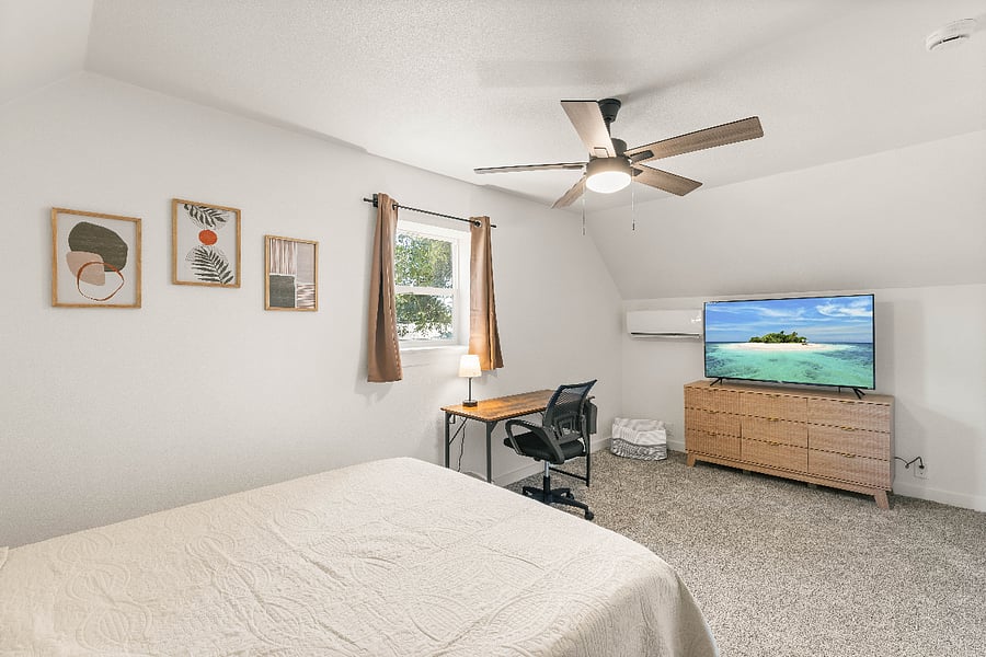 Upstairs bedroom 2 with dedicated work space.