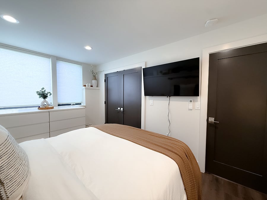 Wall mounted smart tv in bedroom