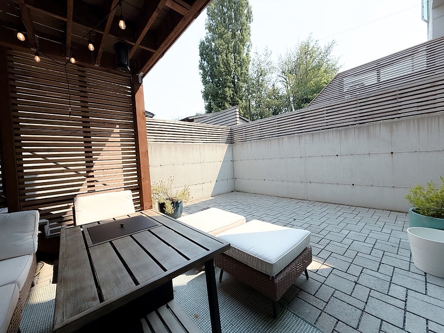 Walled off patio with modern drainage