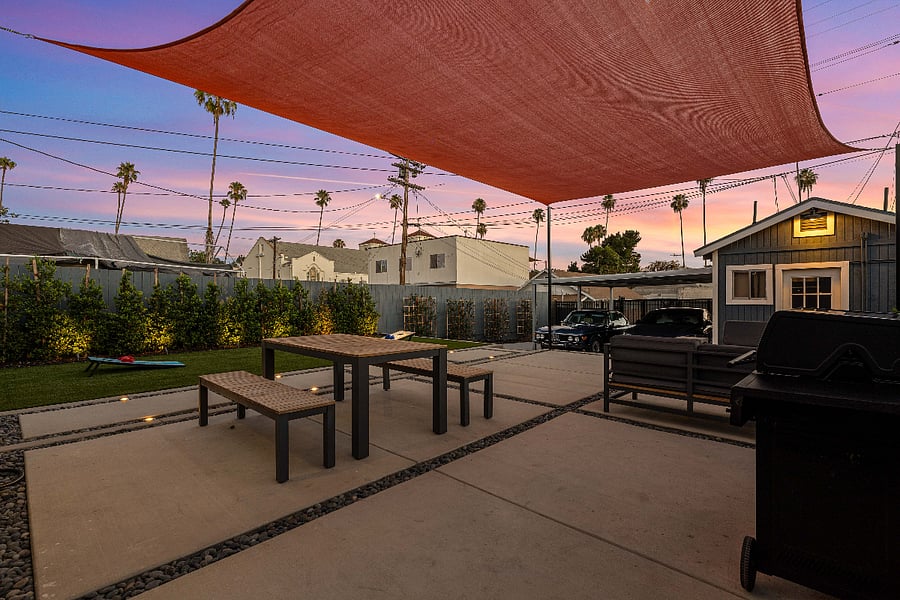 Backyard entertainment area for dining and relaxing.