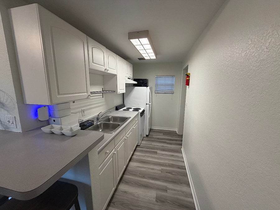 Kitchen includes pots, pans, utensils and even starter dish soap/cleaning supplies. This is the Second Floor.