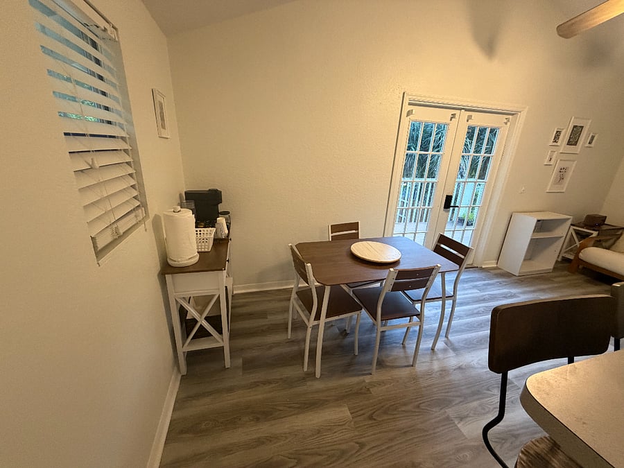 Furnished dining area with coffee machine. include coffee cups and starter supplies such as Nespresso pods. This is the Second Floor.