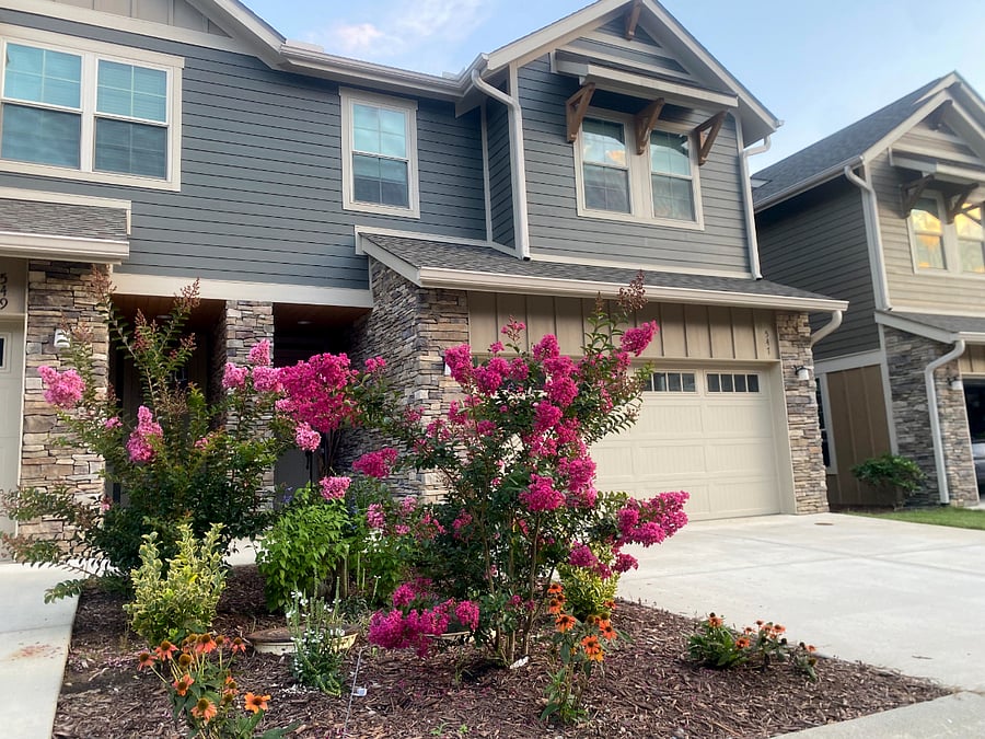 Outside view of house. These units are comprised of two homes. We share a common wall with the other unit. Fortunately, they were built with advanced sound containment materials. So you will most likely never hear the neighbor.