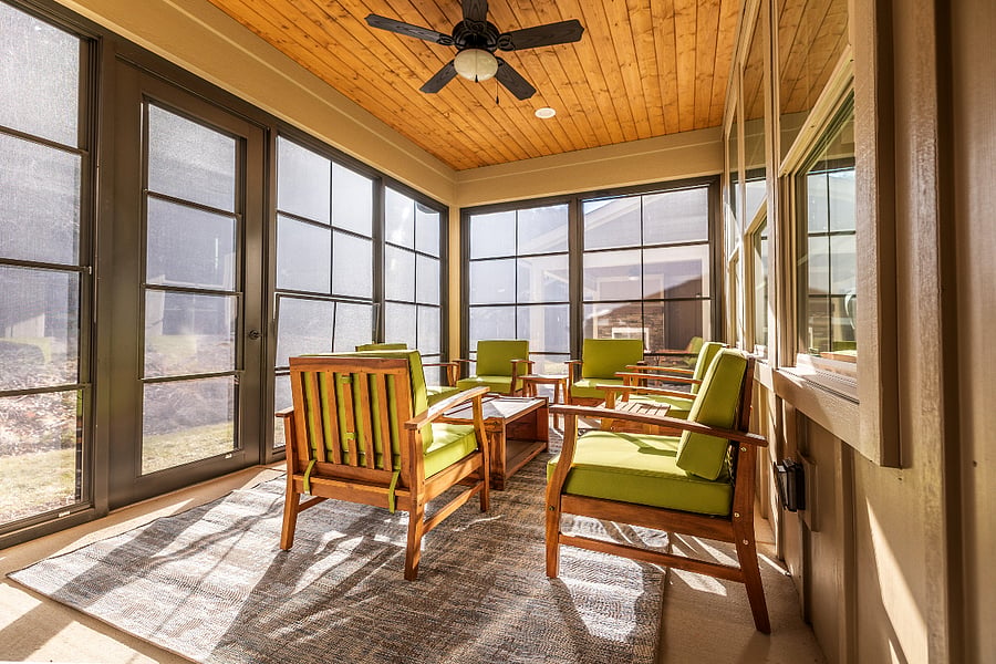The enclosed Sun Room, allows you to lower the the screened windows in the warmer months or keep them closed in the colder months. Please note that the windows are made from a durable plastic with limited insulation properties. So it will get cold, in the cooler months.