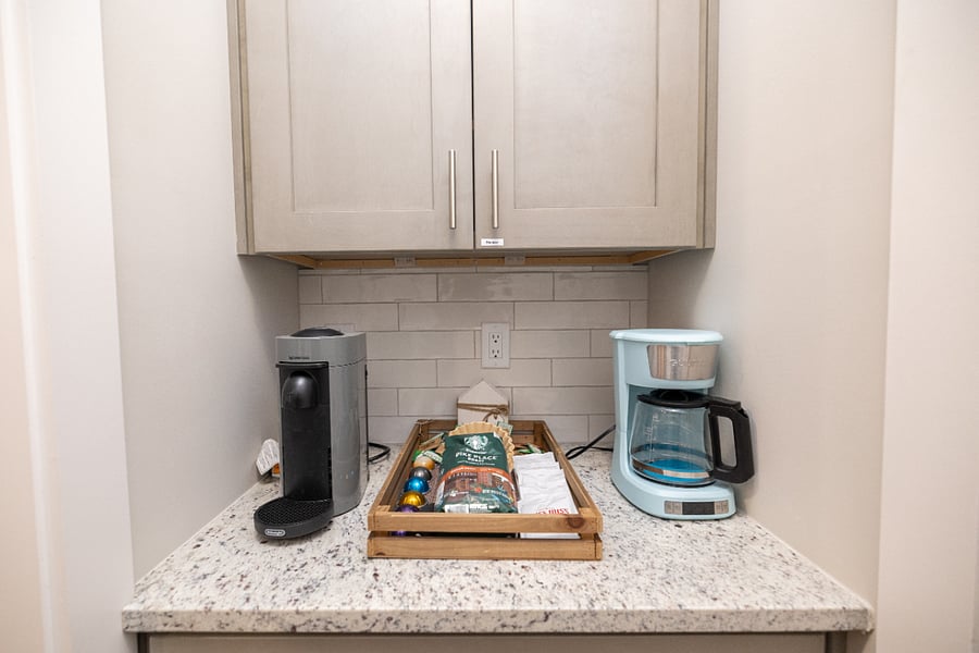 Coffee and Tea Station located in Kitchen. We offer a variety of coffee solutions including a Nespresso machine.