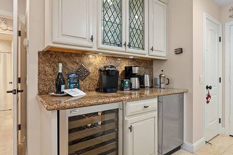 Built-in wine and coffee bar complete with wine cooler and  2nd refrigerator.