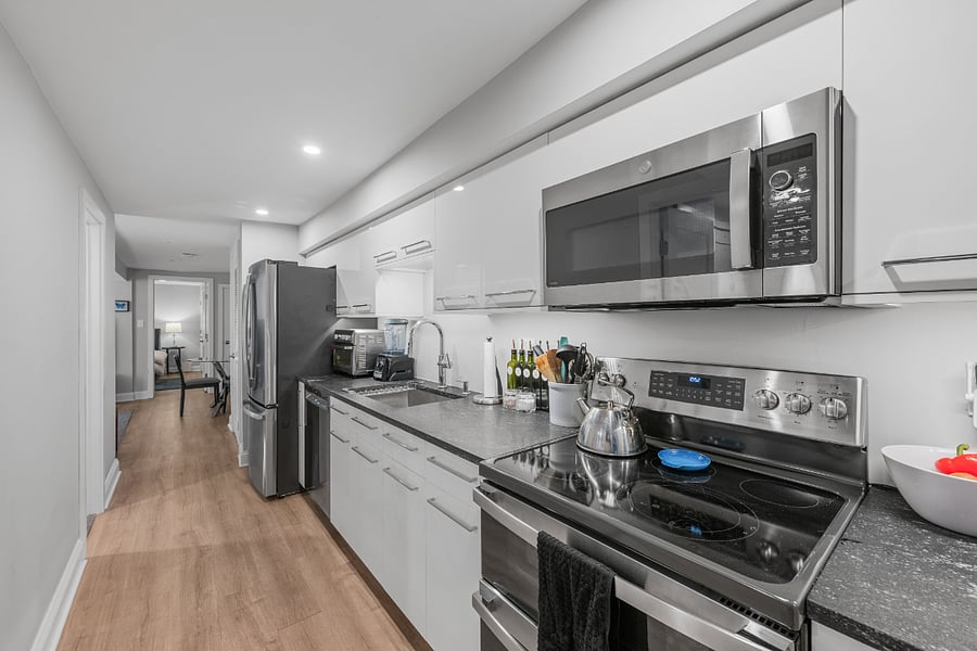Beautiful kitchen with granite countertops and stainless steel appliances.