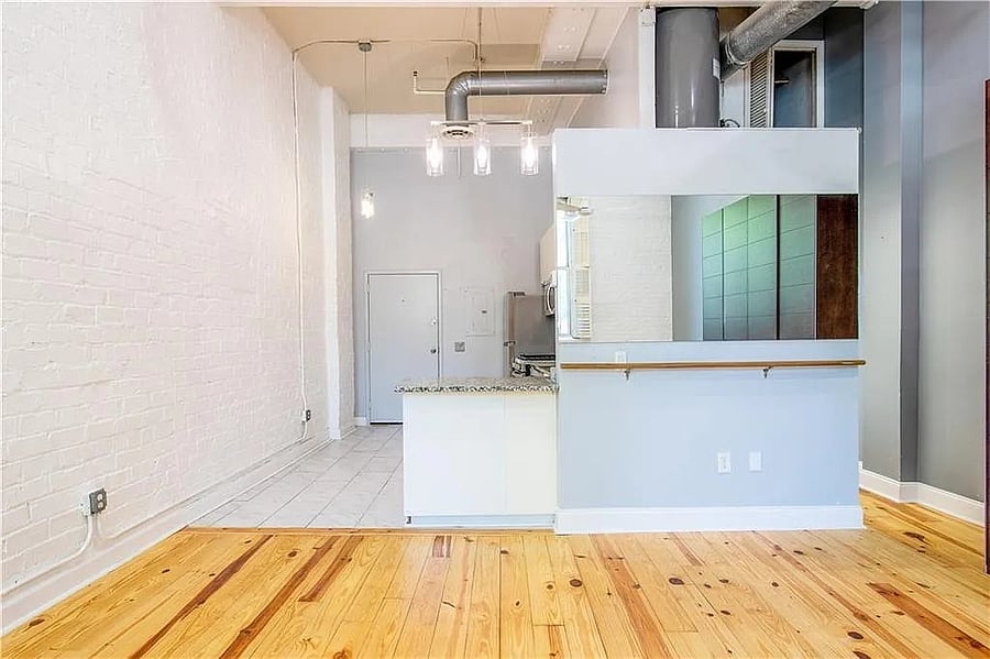 Oversized kitchen connects directly to the main living space, highlighting the lofts open layout