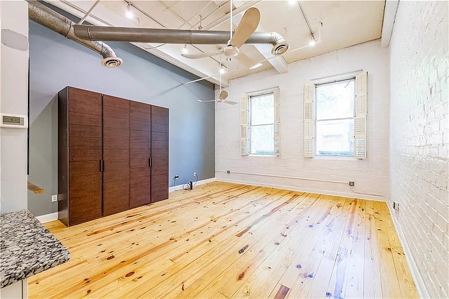Flexible open floor plan will be furnished with a queen bed, sleeper sofa, dining area, and workspace